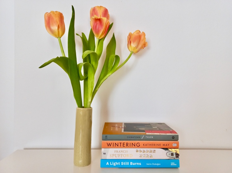 April reading list with tulips